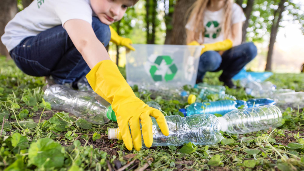 boy-girl-plastic-garbage-collection-park